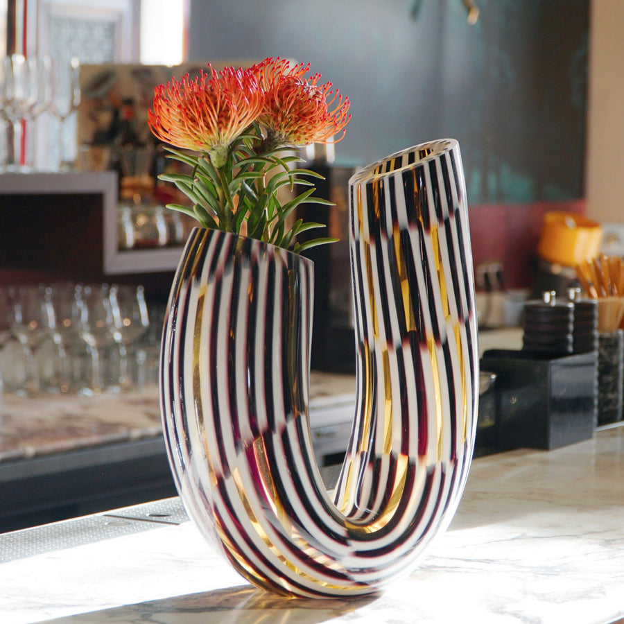 The Boomerang Twid is a unique vase designed by Marco MencaccI. Made in Murano. Murano glass