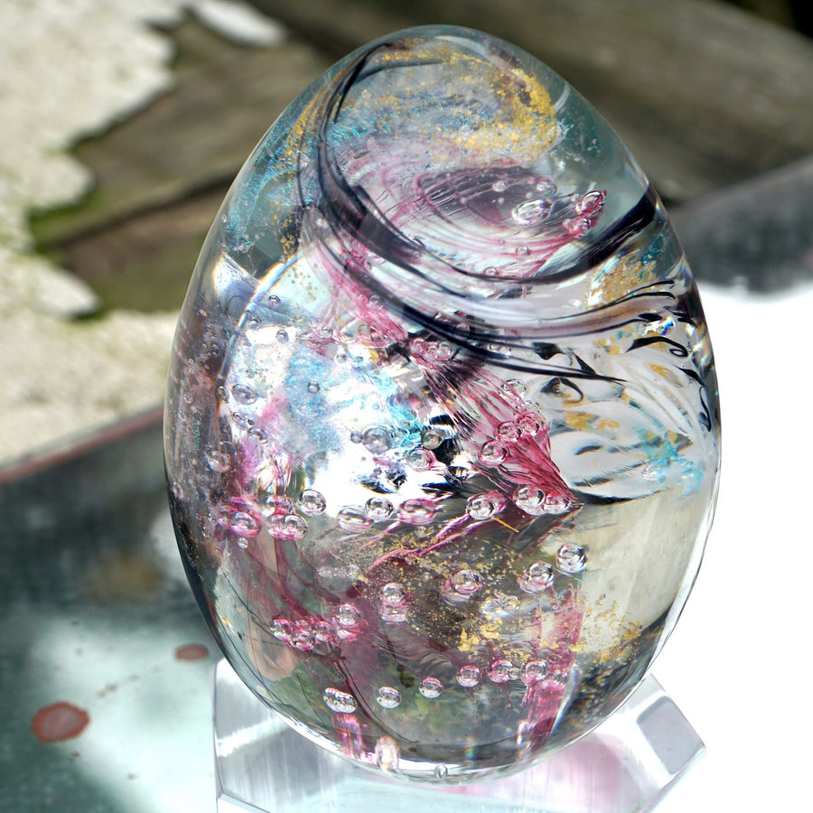 Transparent and pink Glass Egg is a hand sculpted unique piece with Murano Glass using the “Perle Sommerso” technique