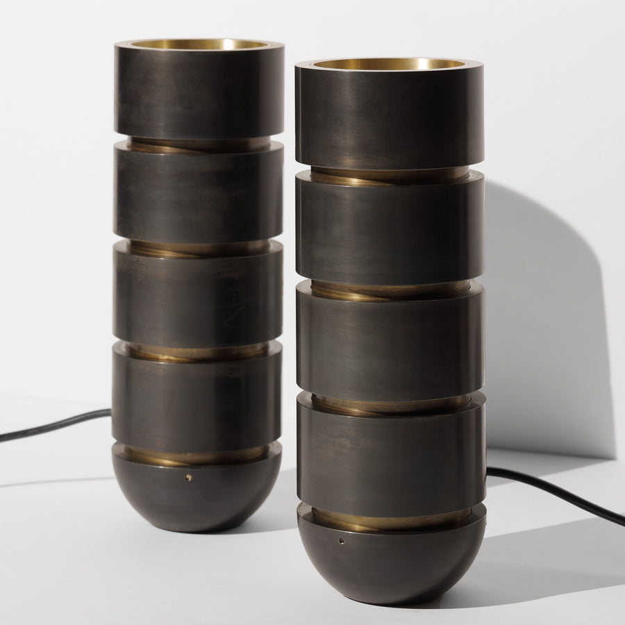 Tarek Shamma Uplighter Lamp. Material: Patinated black steel, patinated brass