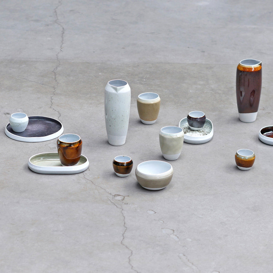 Drinking water supply and soil remediation industries produce thousands of tonnes of metal residue a year. Agne Kucerenkaite has developed ceramic pigments from this waste. Reusing waste decreases the need of natural resources, reduces environmental pollution. Each porcelain piece is hand-crafted.