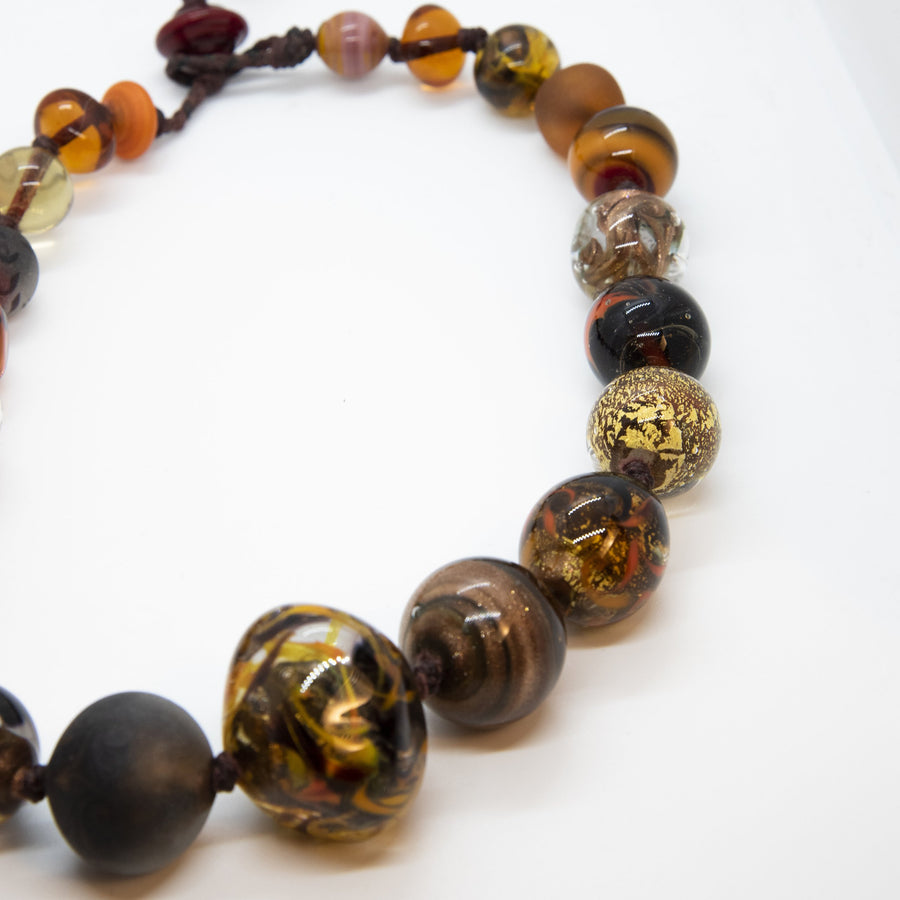 Brown Necklace is an hand-made unique piece with Murano glass beads using the “Perle Sommerso” technique, which consists of submerging colored beads to create a multi layered effect.